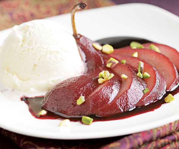Pears in red wine with spices and Whipped Cream